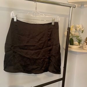 Black satin mini skirt with thigh slit